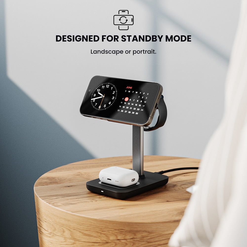 Smartphone stand with phone and AirPods on a wooden surface, labeled 'Designed for Standby Mode'.