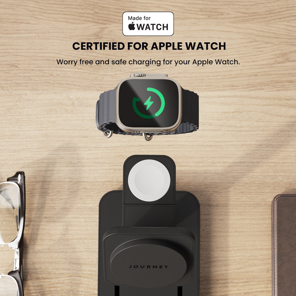 Apple Watch with charging stand on a wooden surface, featuring 'Made for Apple Watch' certification.