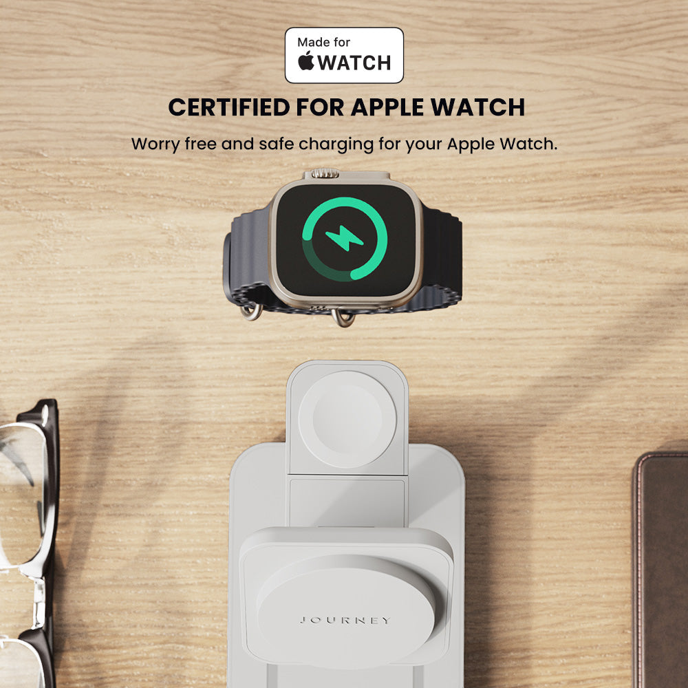 Apple Watch charging dock with 'Made for Apple Watch' certification on a wooden surface.