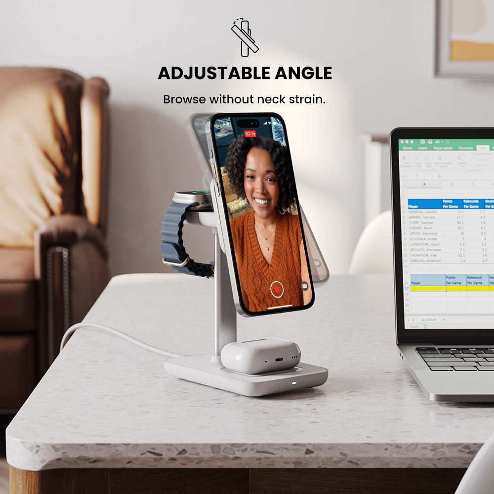 Smartphone stand with adjustable angle on a desk with laptop and mug, featuring text 'Adjustable Angle'.