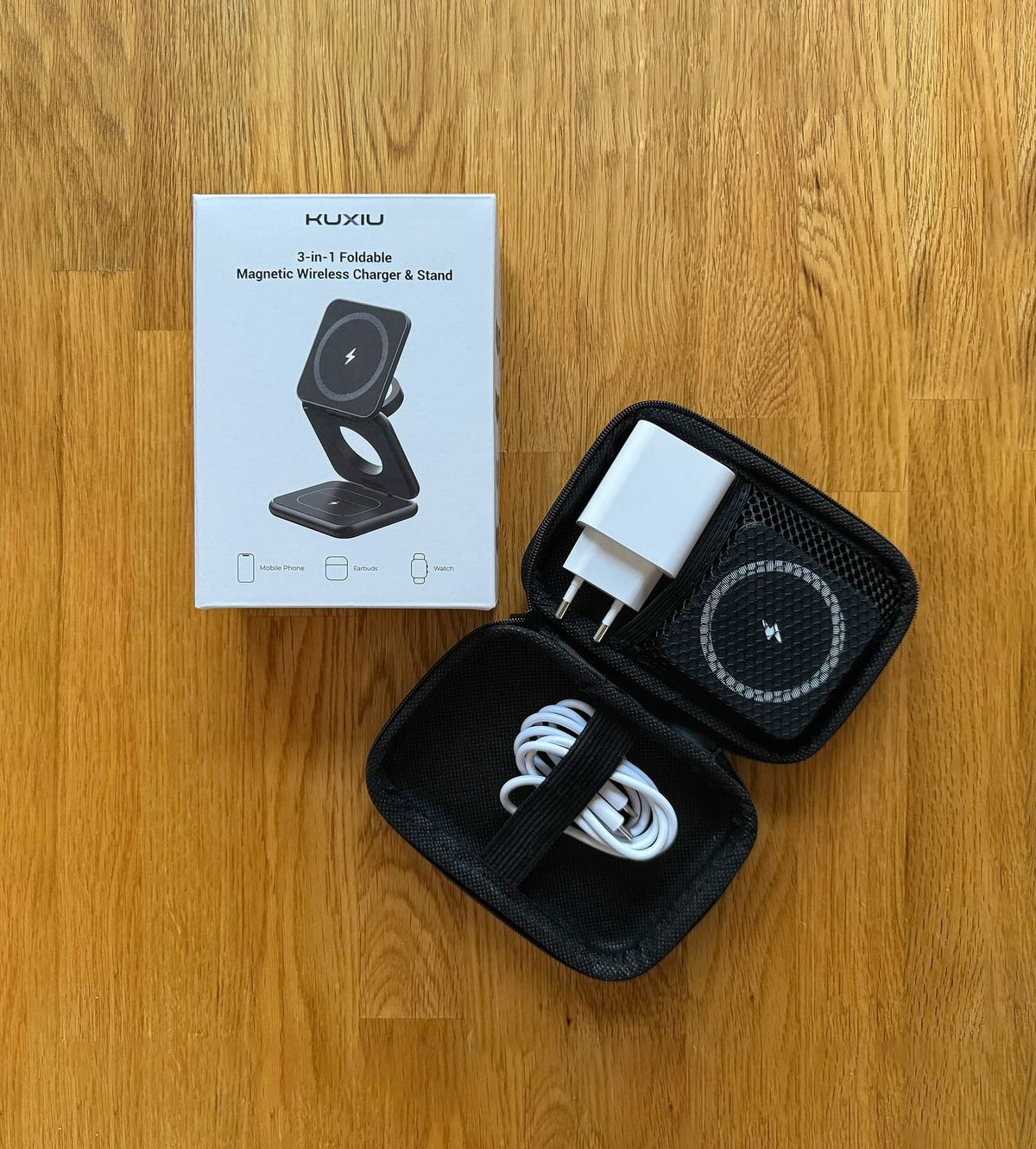 Huxiu magnetic wireless charger and stand with packaging on a wooden surface
