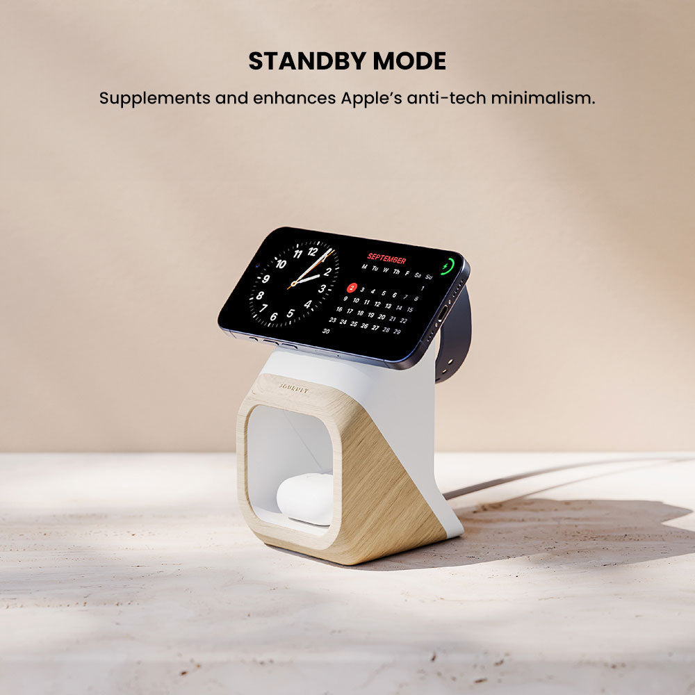 Smartphone dock with smartphone on a wooden stand on a light surface.
