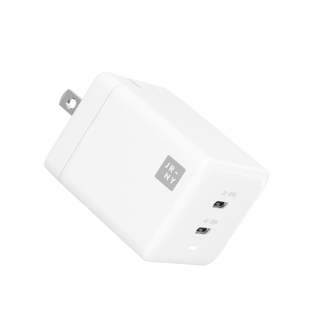 White electrical outlet with JRNY label on a white background