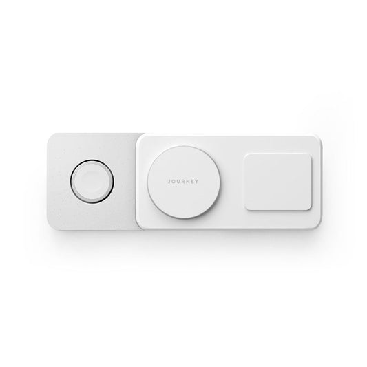 White electronic device with circular and rectangular buttons on a white background