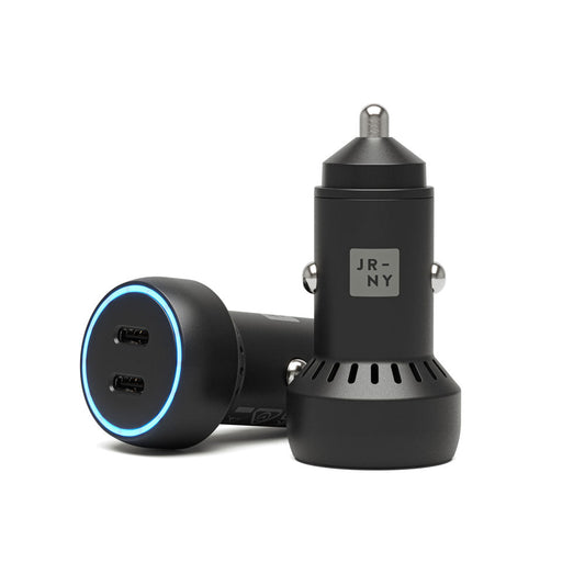 Black car charger with dual USB ports on a white background