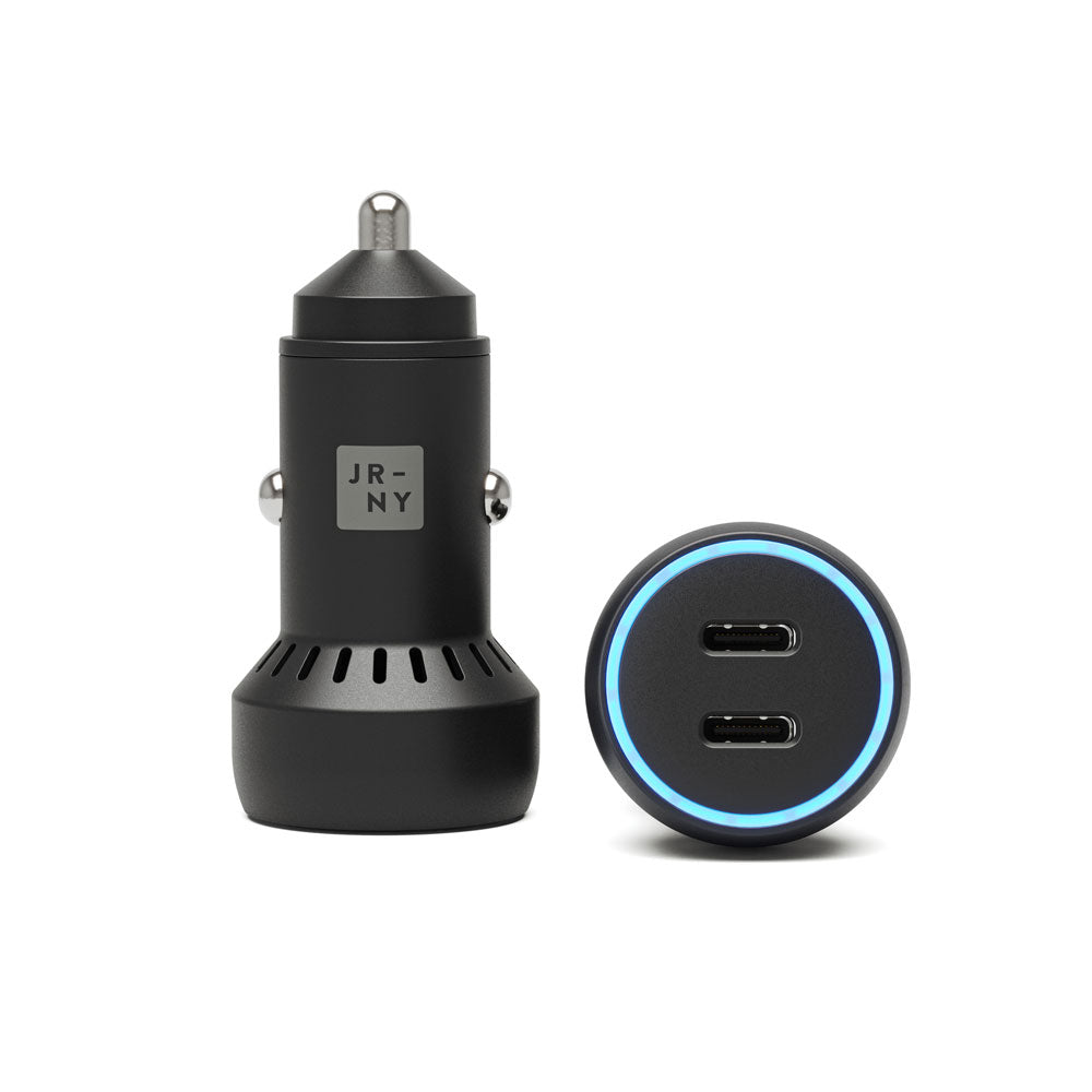 Black car charger and round USB hub with blue lights on a white background