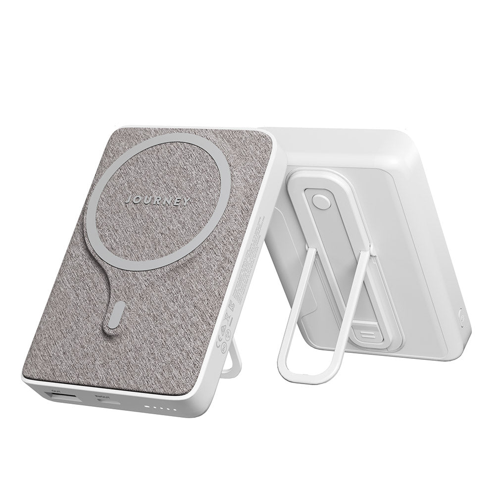 Portable speaker with 'Journey' branding on a white background