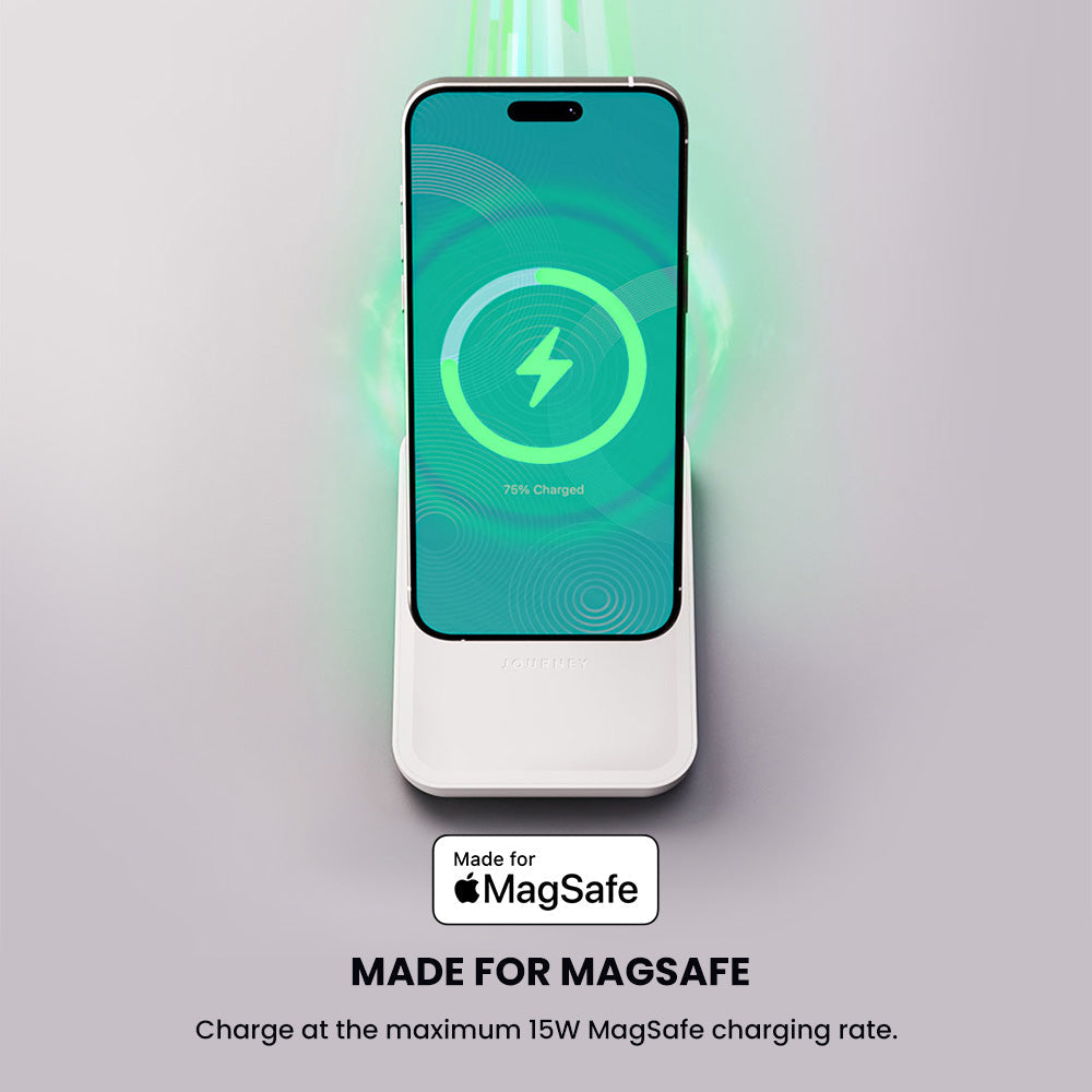 Smartphone with MagSafe charging feature on a light gray background