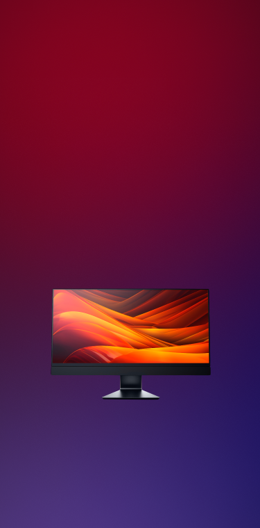 Monitor with colorful display on a gradient red to blue background