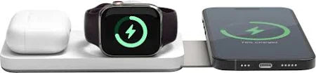 Wireless charging station with smartwatch, phone, and airpods on a white background